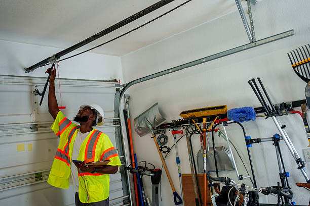 Professional Garage Door Panel Replacement technician working in Perryopolis, PA